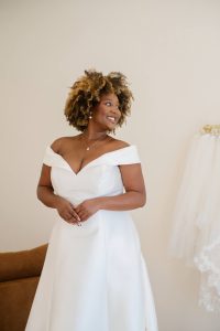 Gorgeous Ivoryology bride to be trying on her wedding dress at the Memphis location.